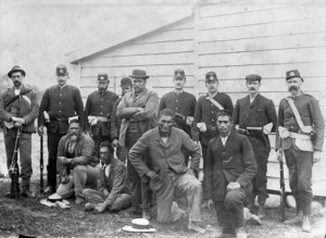 Hone Toia of Rawene (standing, centre) with supporters apprehended in 1899. Source: NZHistory.net.co.nz