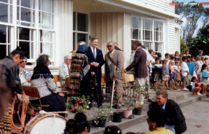 The Pungarehu School Centenary 1992 - new Prime Minister Jim Bolger chats with Te Ru Koriri Wharehoka, kaumātua of Parihaka. Far left (sitting) is Te Miringa Hohaia, alongside Aunty Poppy Bailey.