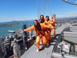 Four sisters braving the Auckland Sky Tower.